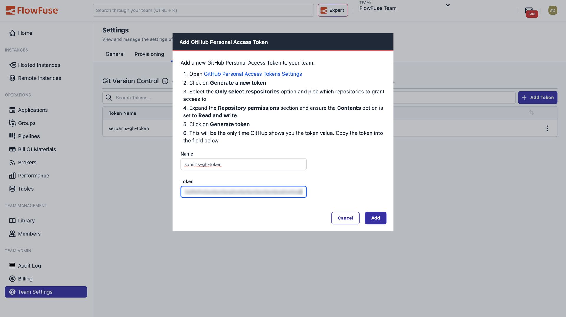 Screenshot of the Add Token dialog where users enter their GitHub Personal Access Token